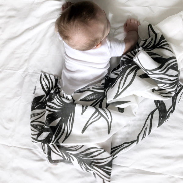 SLIGHTLY IMPERFECT- MUSLIN SWADDLE BLANKET - B+ W LEAVES FRAME - Dotboxed